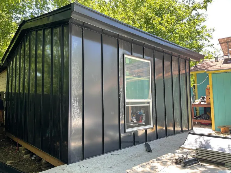 Black standing seam metal wall panels for Roof Inspection in Bangor